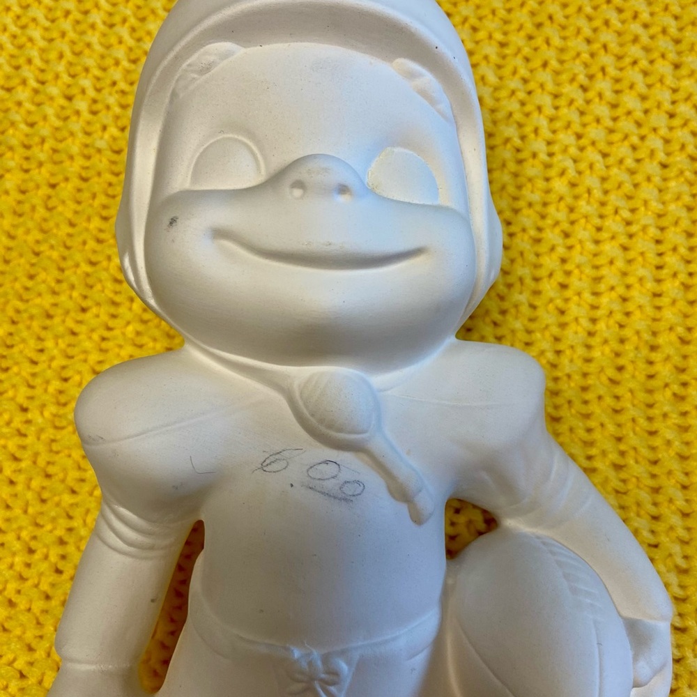 Vintage “Smiley Boy” football statue